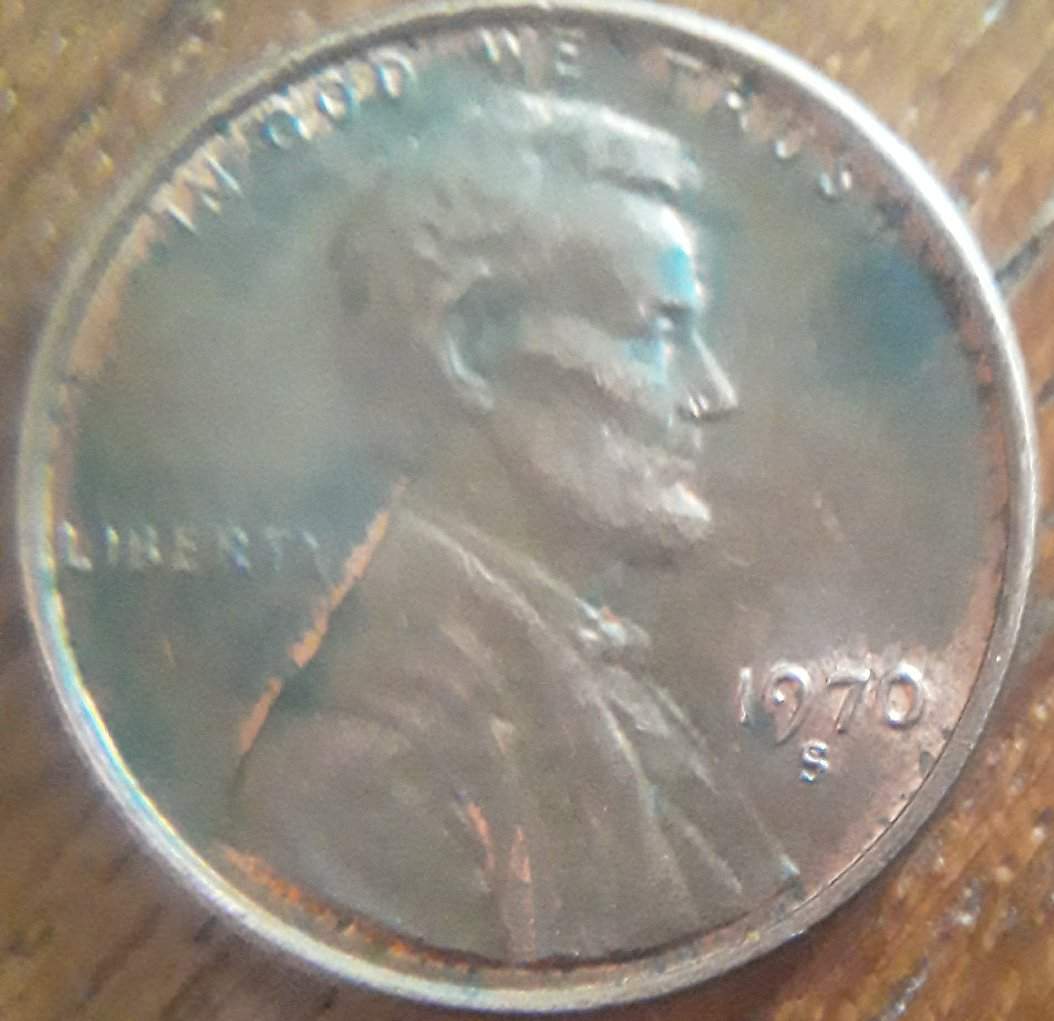 This-Penny-Was-In-The-Jar-Along-With-Many-Other-World-Coins-.