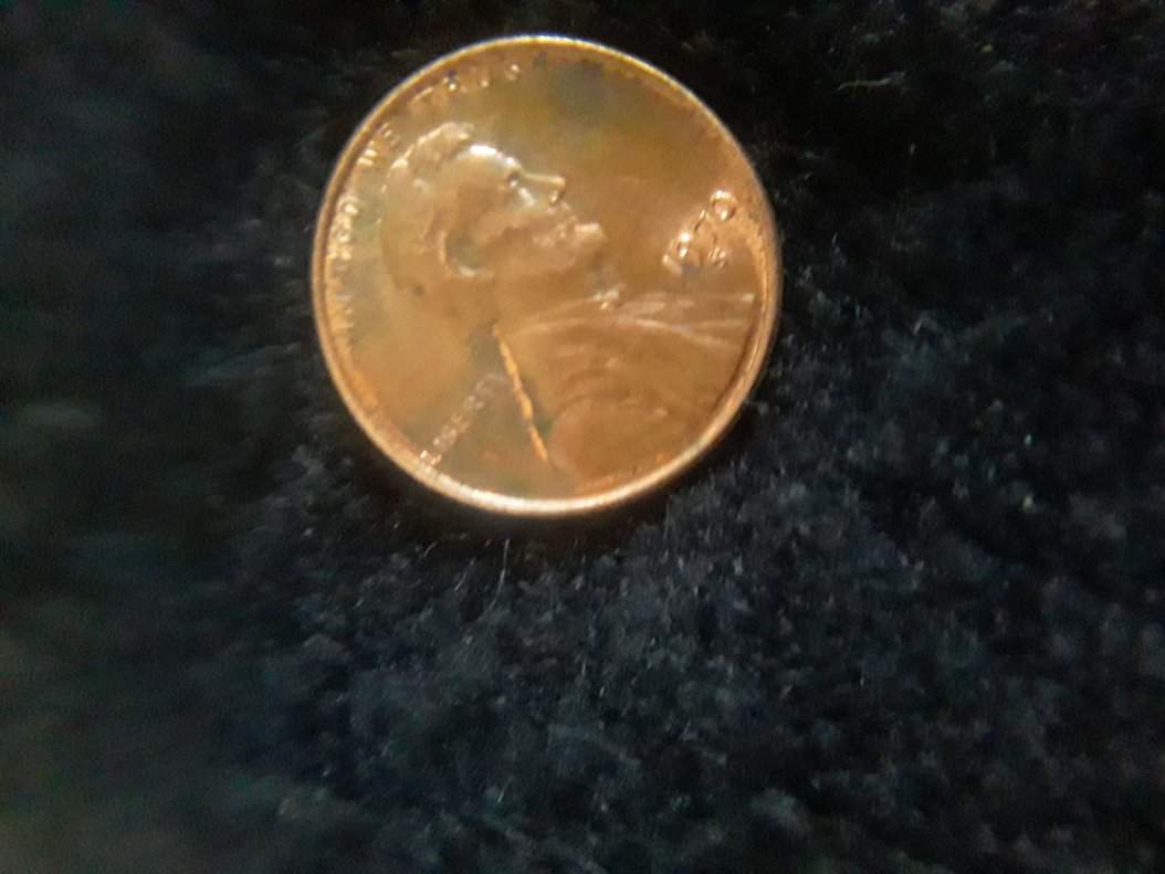 This-Penny-Was-In-The-Jar-Along-With-Many-Other-World-Coins-.
