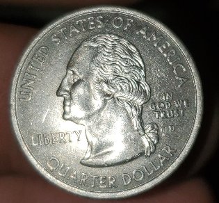 2002-Quarter-Denver-Mint.lines-On-The-Back-Side?