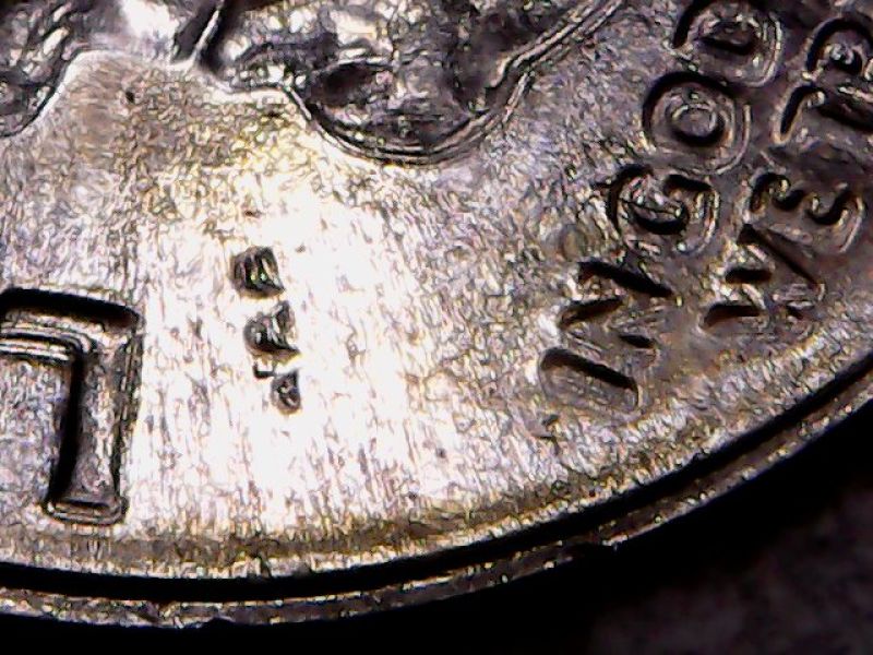 Did-These-Marks-Happen-At-The-Mint-Or-In-Circulation?