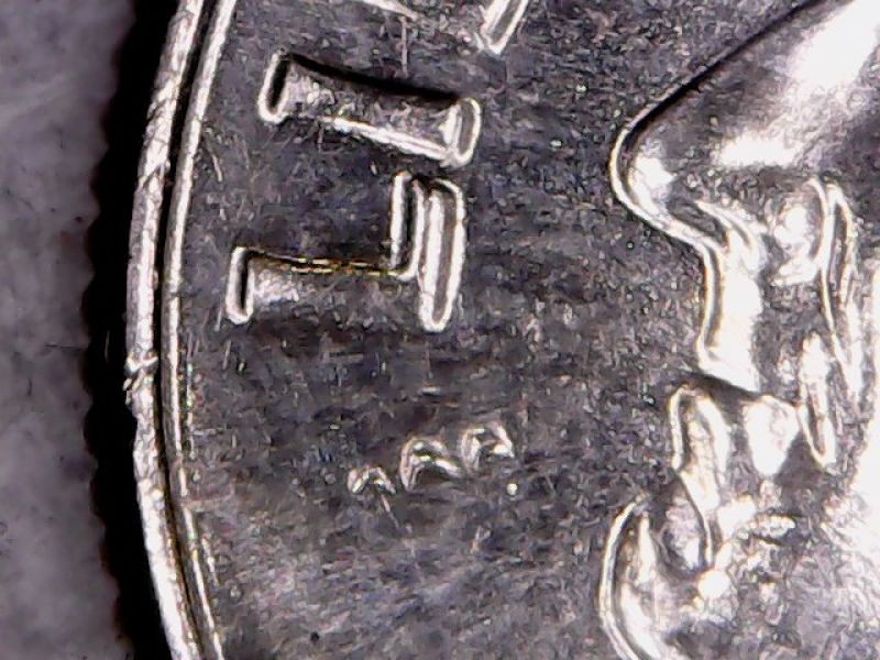 Did-These-Marks-Happen-At-The-Mint-Or-In-Circulation?