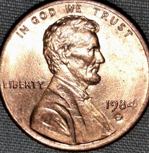 1984-D-Penny-What's-This-On-Back-Through-United?-The