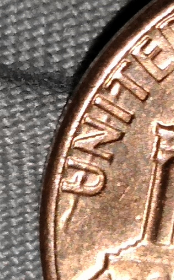 1984-D-Penny-What's-This-On-Back-Through-United?-The