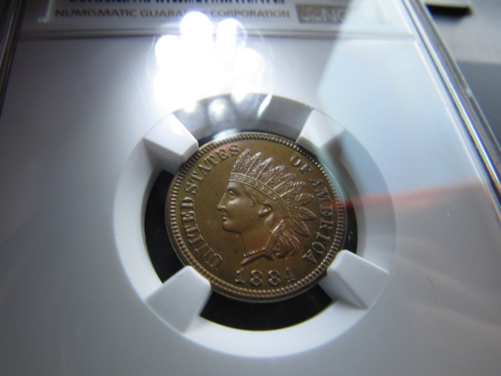 1884-Proof-65-IHP-Brown-With-Nice-Color