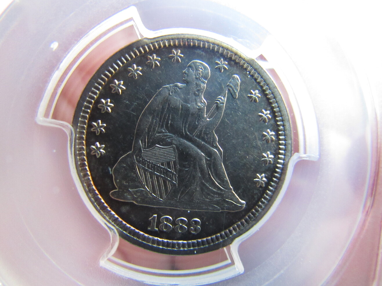 1883-PF-55-Seated-Liberty-Quarter