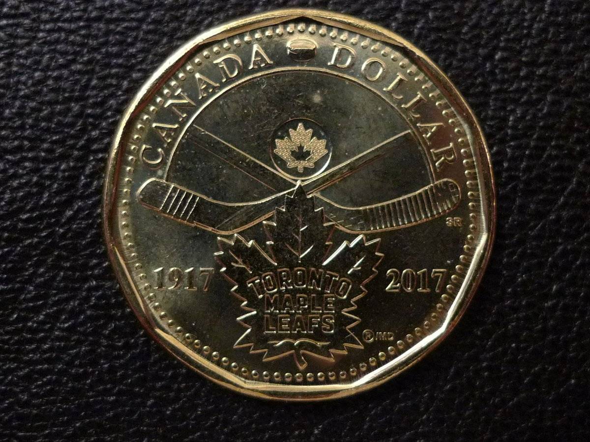 Canadian-One-Dollar-Reverse-Designs-And-Coin-Specifications.