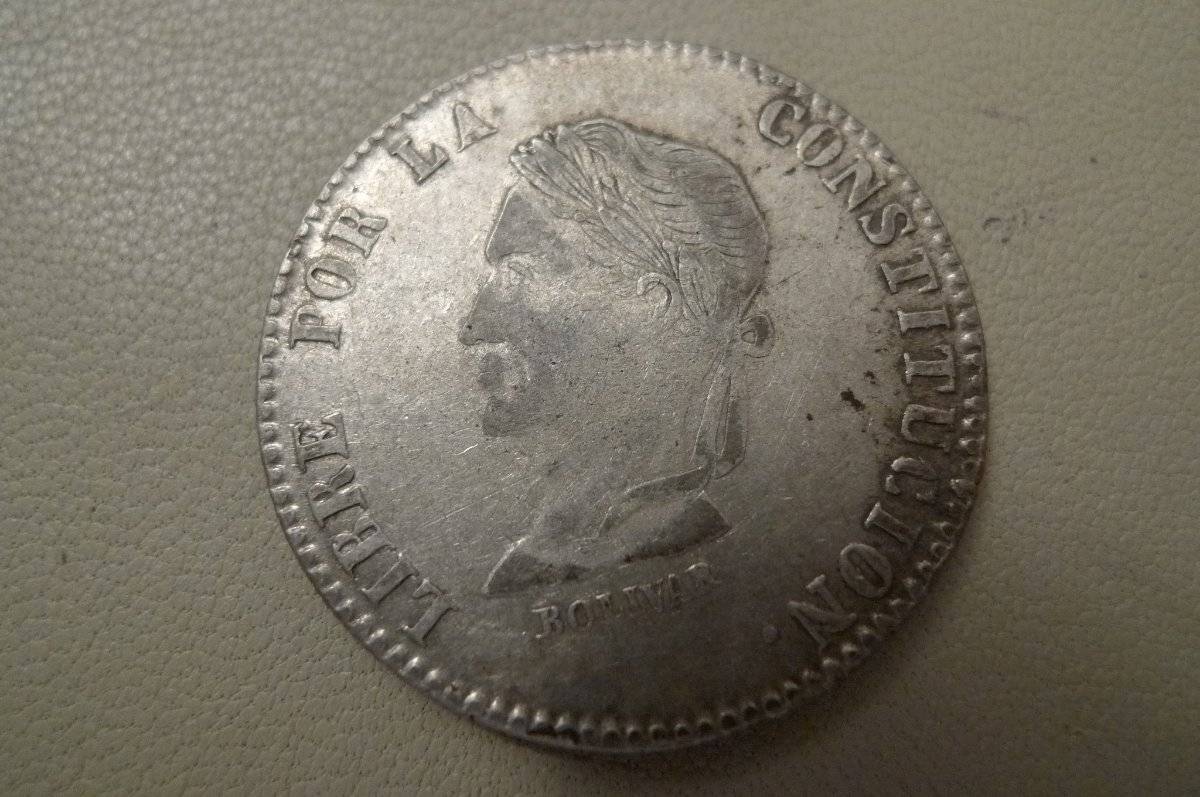 4-Soles-1858-Struck-On-A-Previous-Coin?