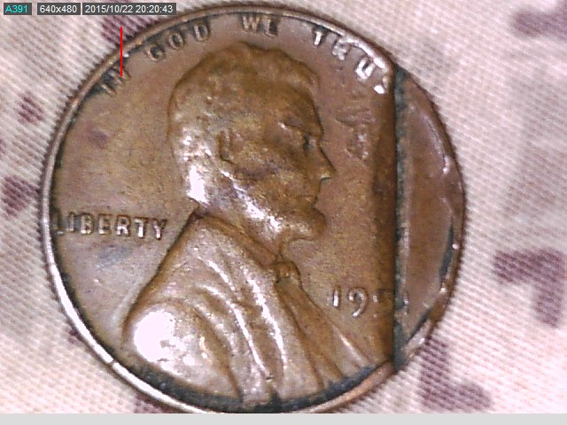 1951-Cent-With-A-Straight-Cut-In-It-But-Its-Together