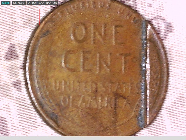 1951-Cent-With-A-Straight-Cut-In-It-But-Its-Together