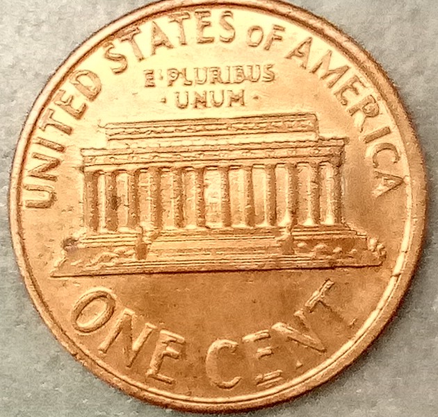 1990?-Penny-Appears-To-Be-Struck-Through-Grease?