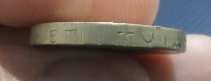 Odd-Shaped-Script-On-The-Edge-Of-A-1996-Celtic-Cross-One-Pound-Coin