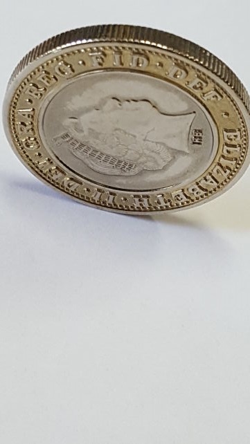 Weird-Looking-�2-Coin/-Fake?