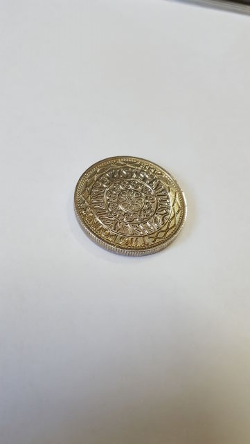 Weird-Looking-�2-Coin/-Fake?