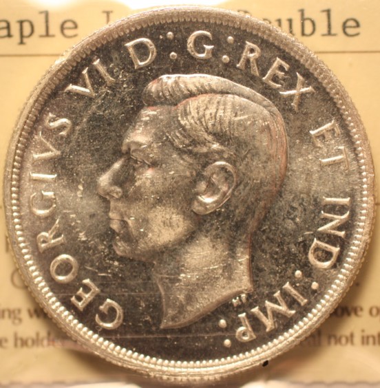 1948-Versus-1947-Maple-Leaf-$1---What's-The-Deal?