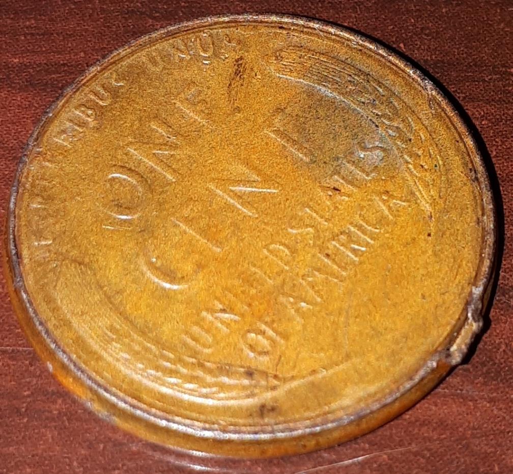 1-Cent-1958-D-Border-Stripped