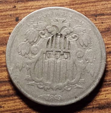 Origin-Of-Inverted-Shield-Stamped-On-Shield-Nickel