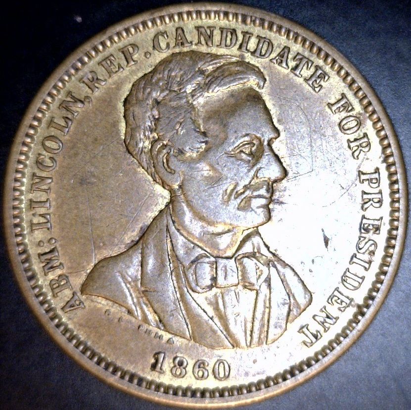 Vote-The-Land-Free-Counterstamp-On-1853-With-Arrows-Seated-Liberty-Quarter