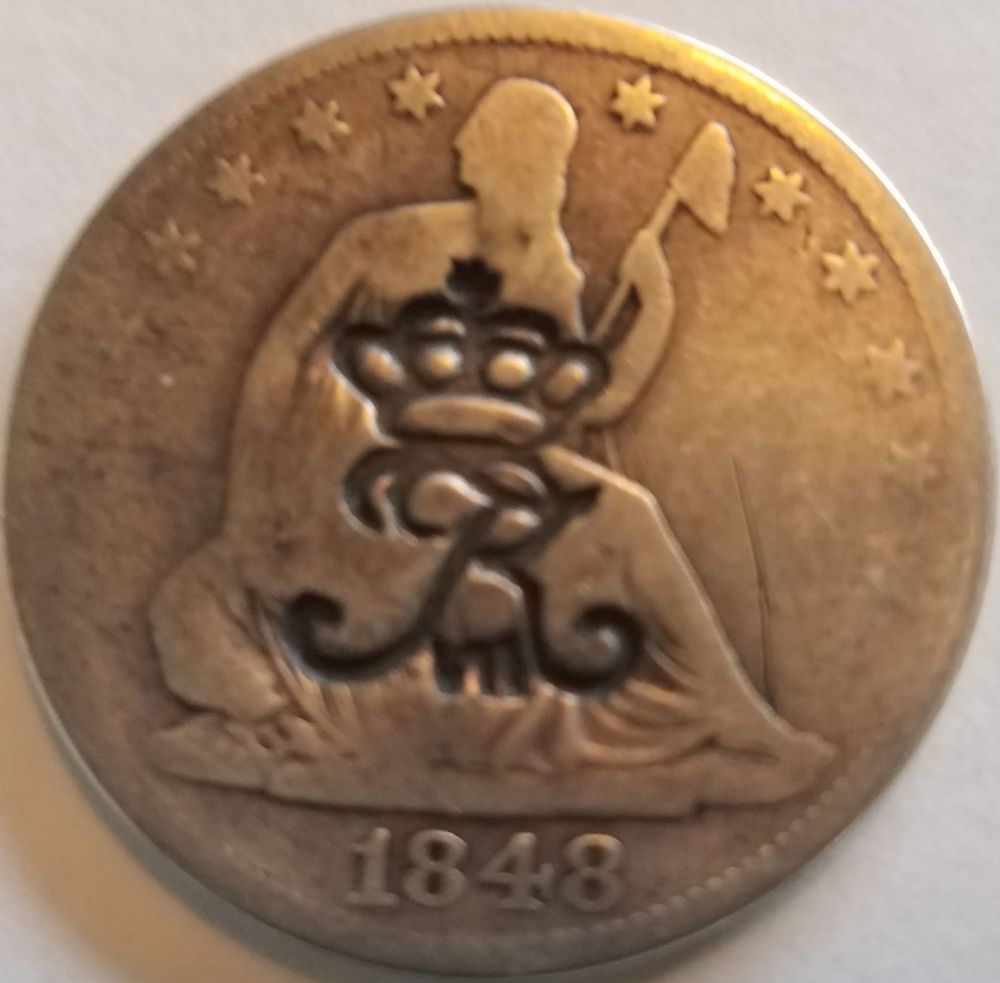 Seeking-Help-To-Attribute-A-World-Countermark-On-An-1848-US-Half-Dollar