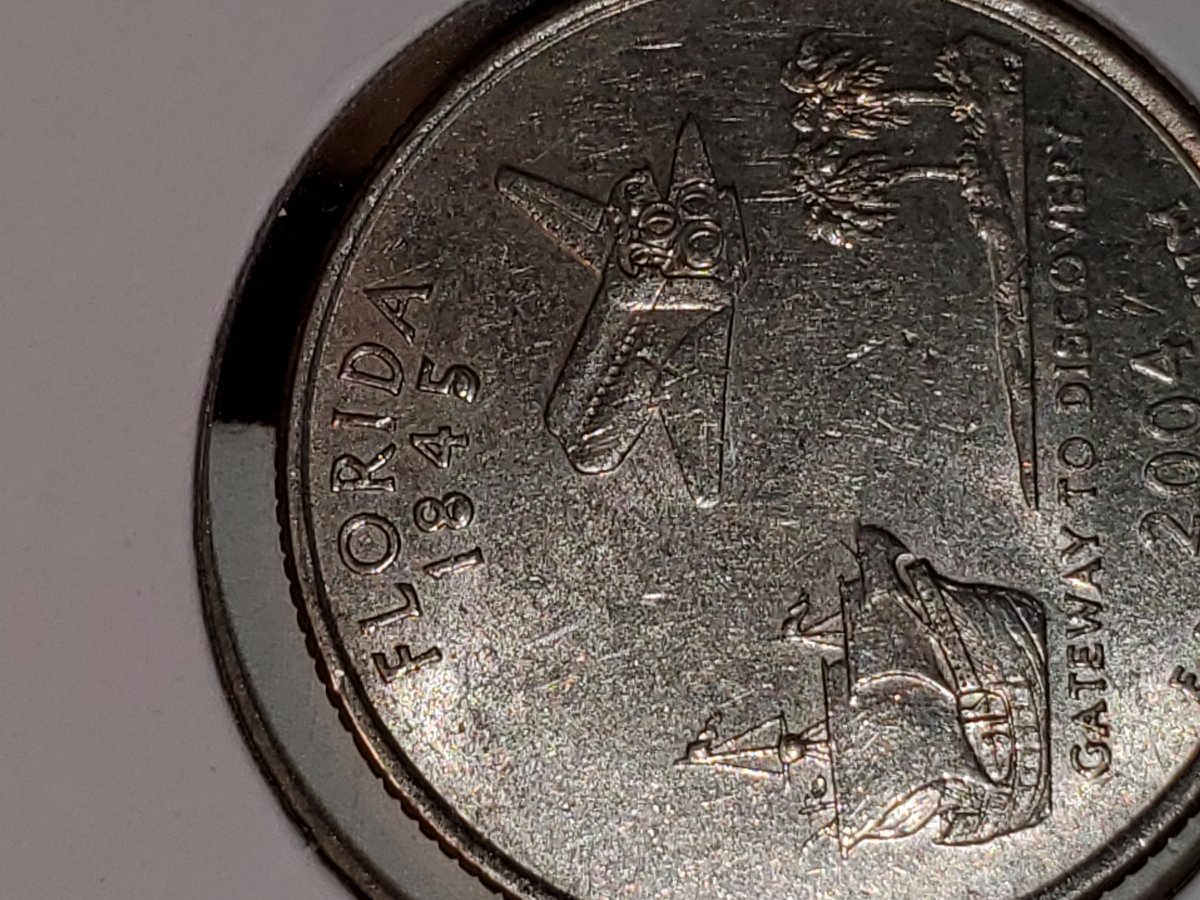 Florida-Quarter-With-Some-Kind-Of-Errors-In-Reverse-Date.-Cuds?-Chips?-Any