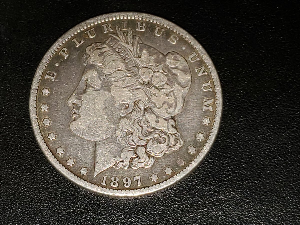 1897-Morgan-O-Mint-Mark.-Coin-Has-Slight-Blue/Green-Tone-Unable-To-Capture
