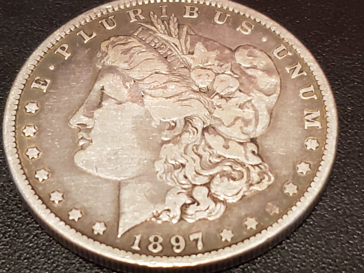 1897-Morgan-O-Mint-Mark.-Coin-Has-Slight-Blue/Green-Tone-Unable-To-Capture