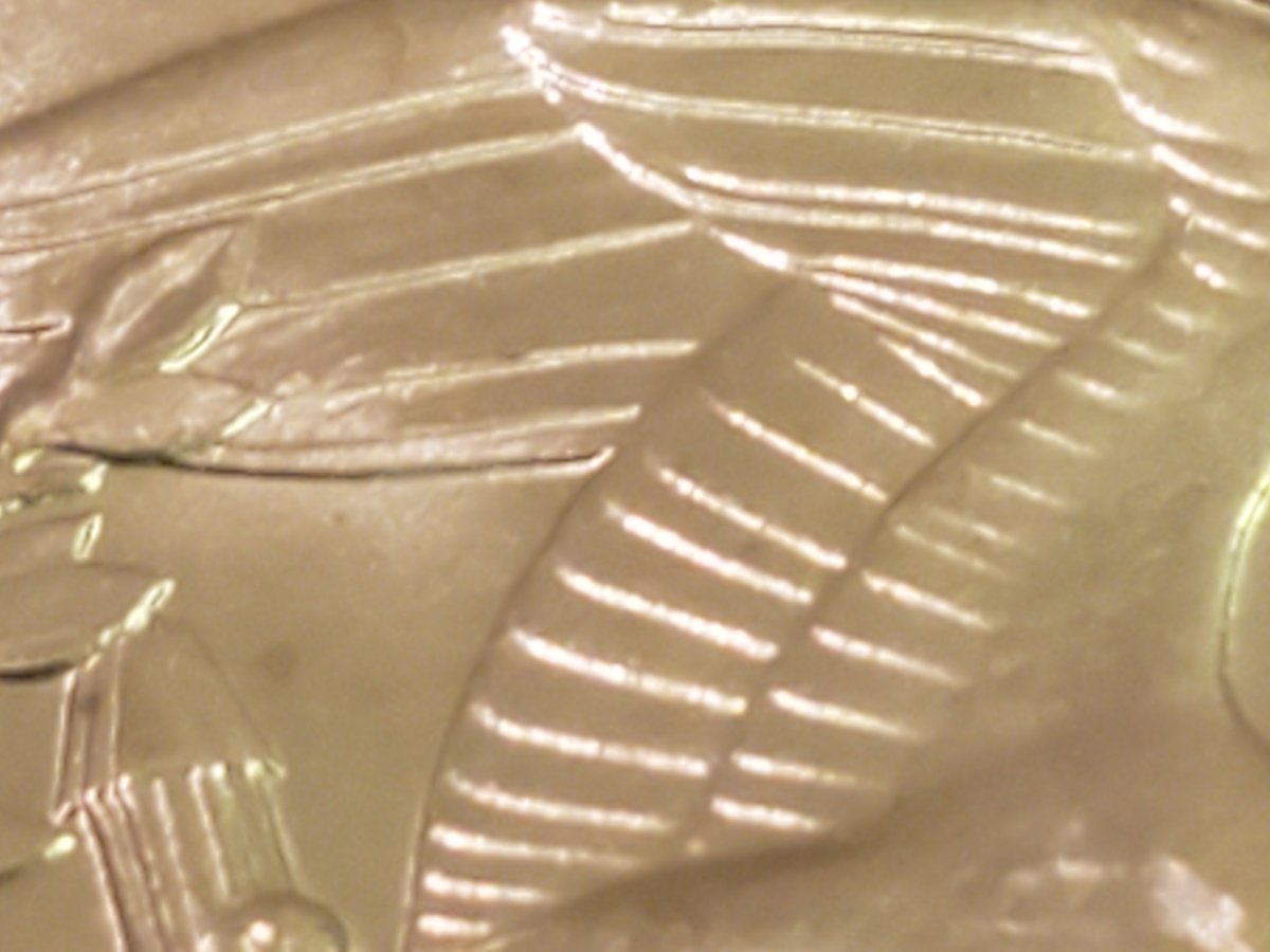 1977-D-Quarter.-Is-This-Doubling-On-The-Wing-Lines-And-R-In-Liberty?