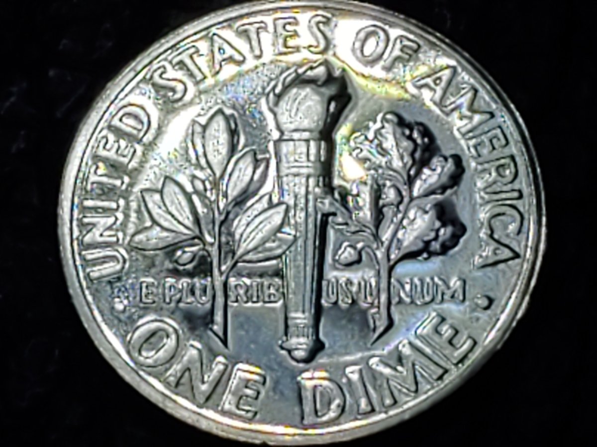 1957-Proof-Dime.-Curious-Of-Grade,-Full-Torch,-Worth-Sending-Off?