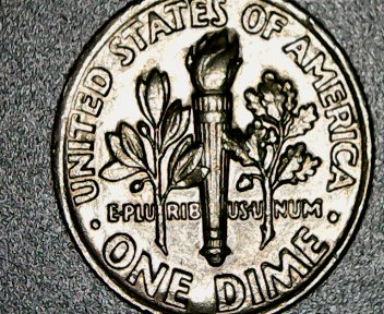 Large-Mole-On-Side-Of-Lip-And-Eye-,-If-Visible.-1989-P-Dime