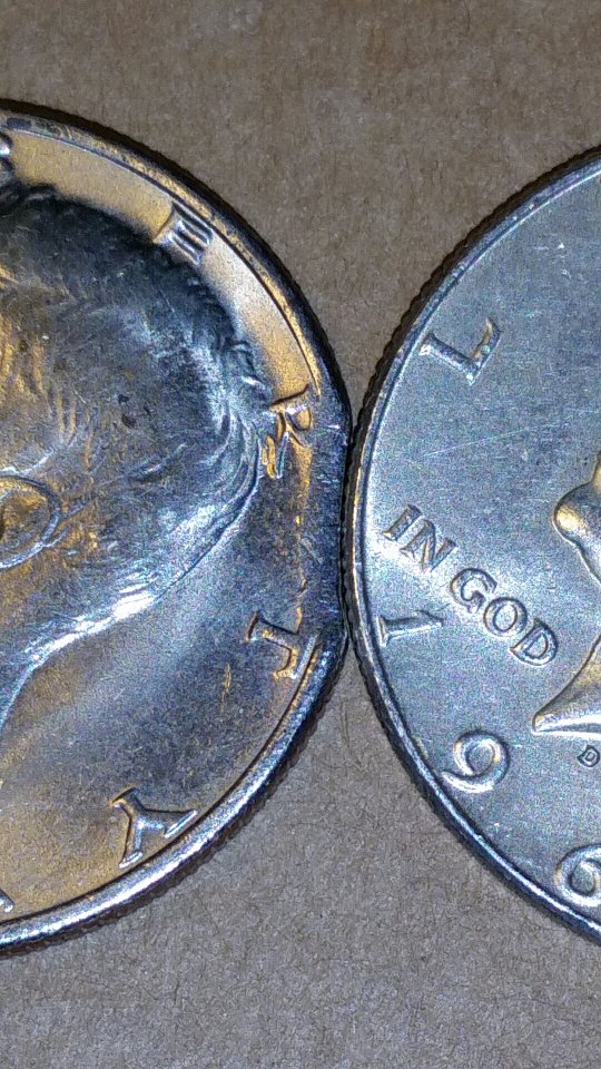 Kennedy-Half-With-A-Possible-Faulty-Planchet?-Missing-A-Rounded-Chunk