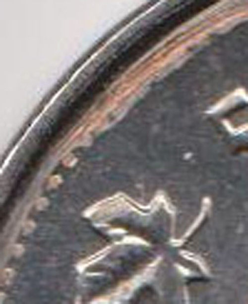 2011-5-Cent-With-Rim-Damage