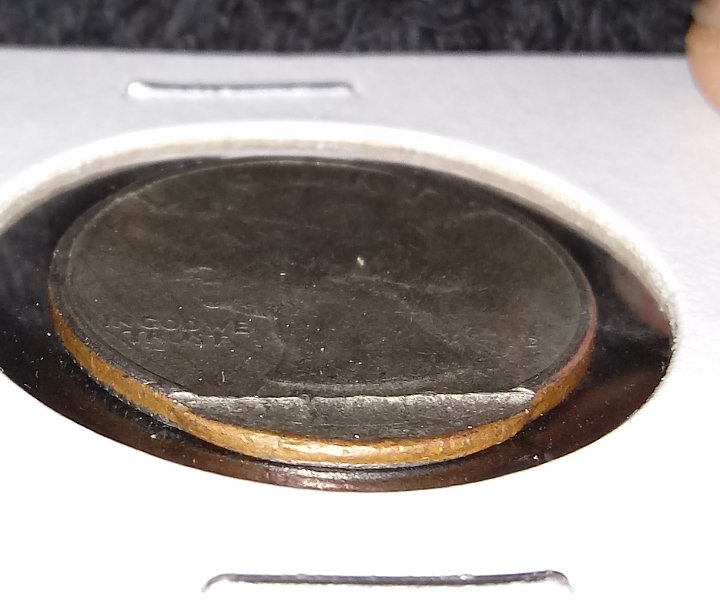 Curious-Clad-Washington-Quarter-?