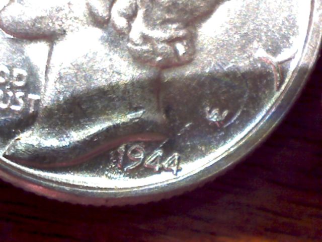 1944-Mercury-Dime-With-An-Odd-Pair-Of-44-S