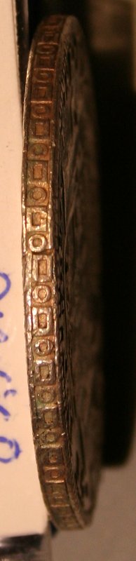 First-8-Reales-Coin