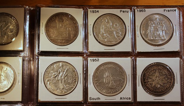 What-Are-Some-Affordable-Large-World-Silver-Coins-Near-Spot?