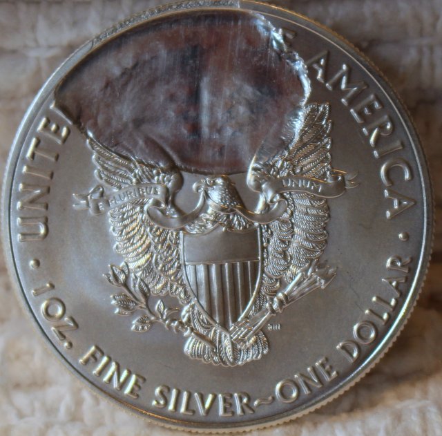 2016-Bullion-Silver-Eagle-Strike-Through-Or-Lamination-Error?