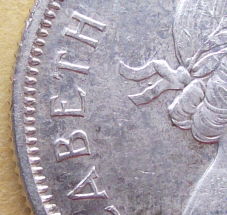 1959-Canadian-Quarter---Double-Strike-And-Dot?