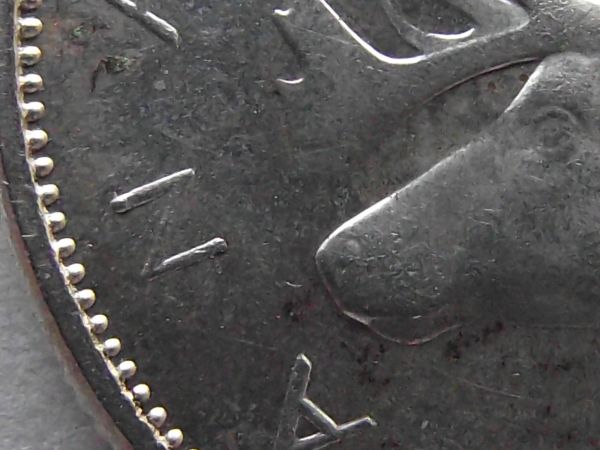 1959-Canadian-Quarter---Double-Strike-And-Dot?