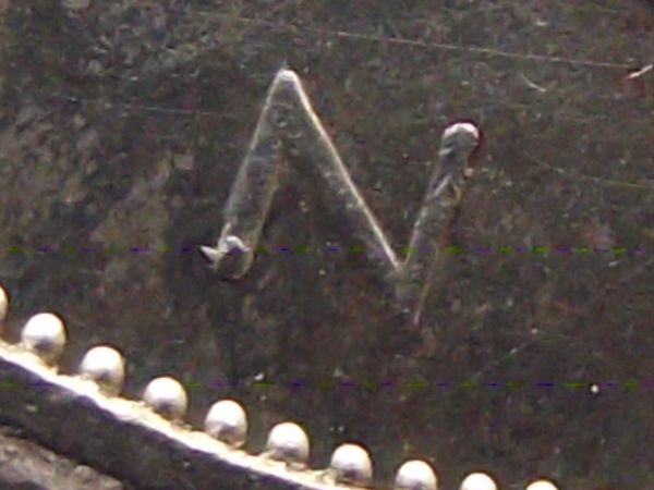 1959-Canadian-Quarter---Double-Strike-And-Dot?