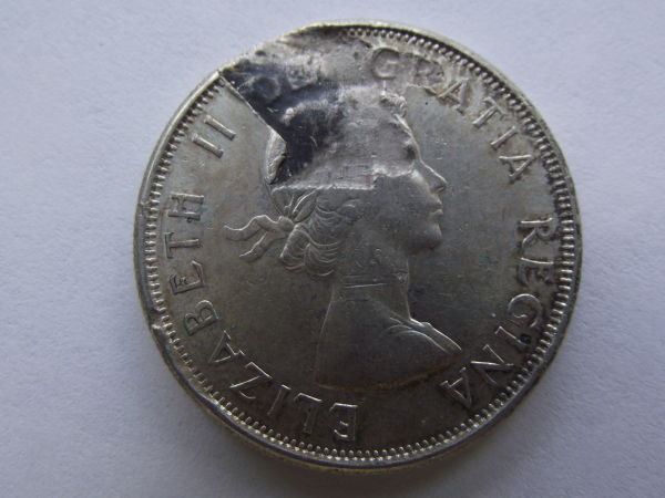 1961-50-Cents---Planchet-Flaw?
