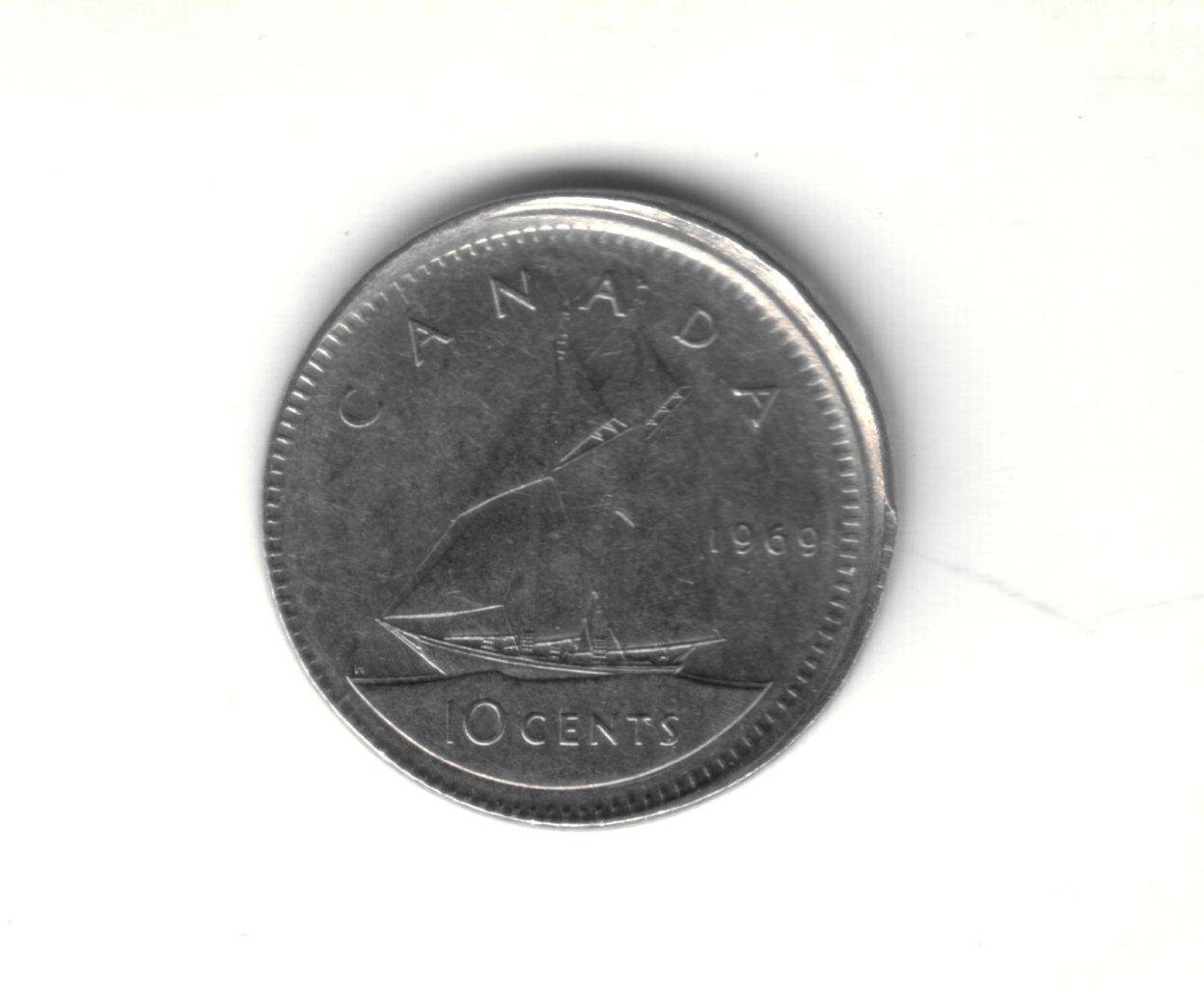 1969-Dime-Stamped-Off-Center---Premium?
