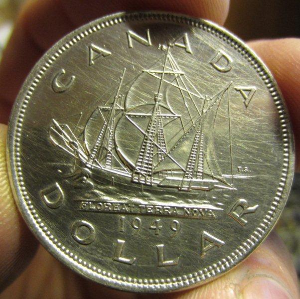 Many-Hairlines-On-A-Silver-Dollar--How'd-They-Get-There?