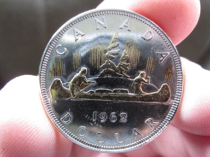 1963-Canadian-Silver-Dollar-With-Gold-On-It