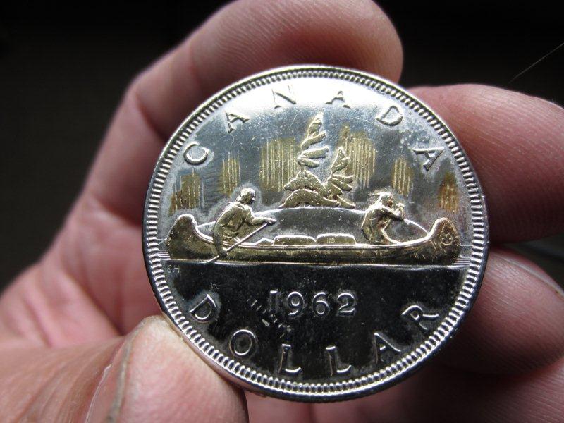 1963-Canadian-Silver-Dollar-With-Gold-On-It