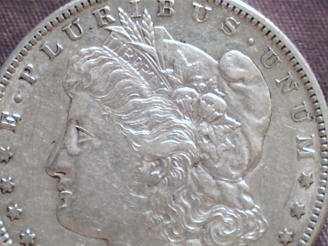 One-Sided-Cleaning-On-This-1884-S-Morgan?