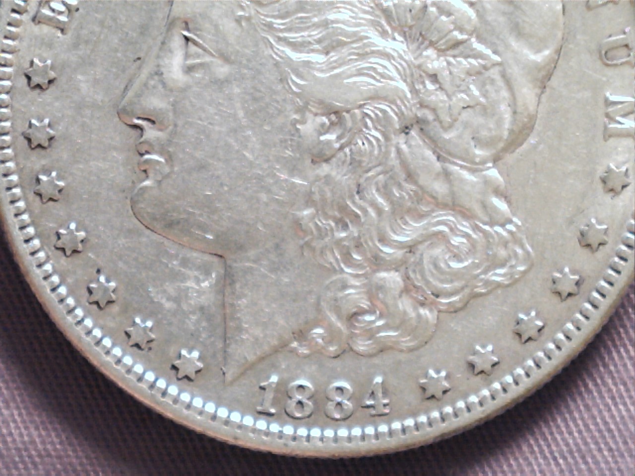 One-Sided-Cleaning-On-This-1884-S-Morgan?