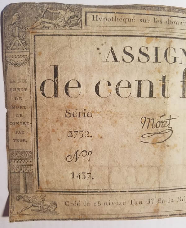 One-French-Note-On-Rice-Paper,-2-World-Tokens.-Help?