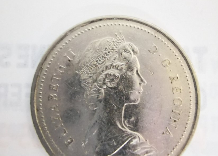 1973-Quarter,-Heart-Shape-Dent.
