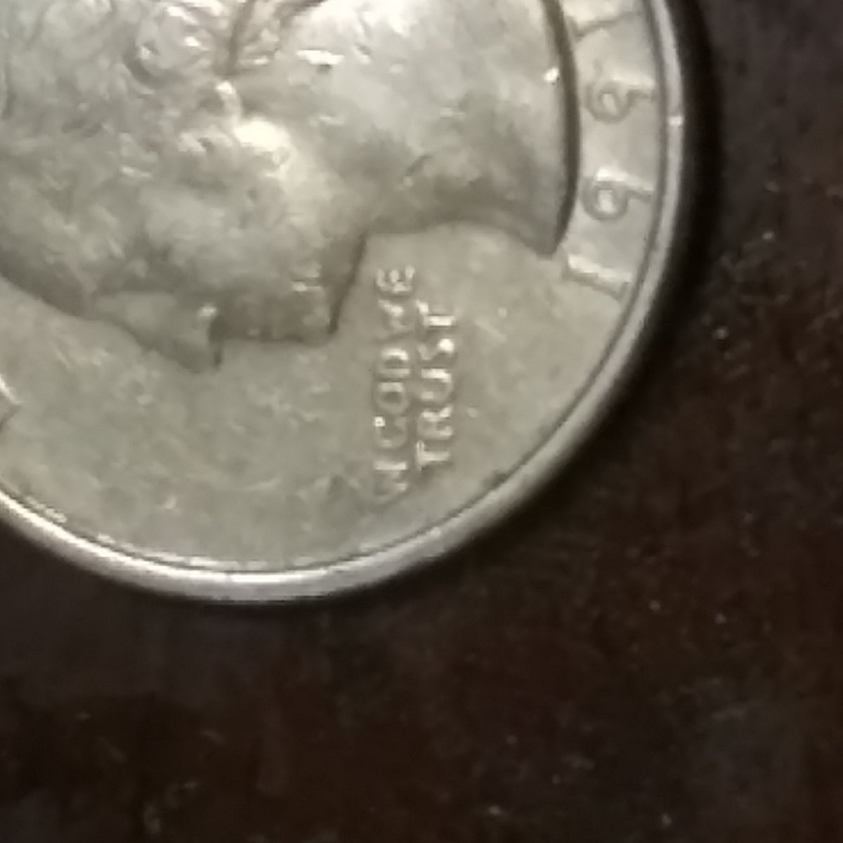 1991-Quarter-I-And-N-Fused-To-Make-W-In-God-We-Trust-Error-Or-Damaged?