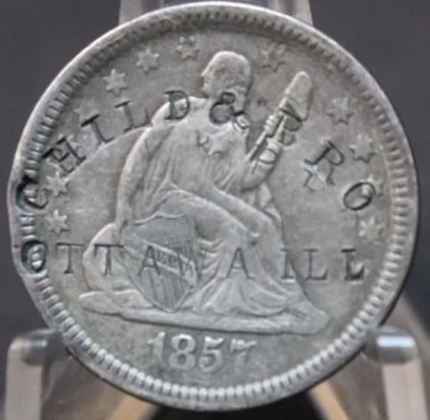 1857-Seated-Quarter-With-Counterstamp