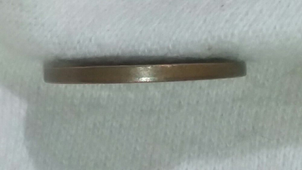Please-Tell-Me-What-Is-Up-With-This-Coin-Lmc.